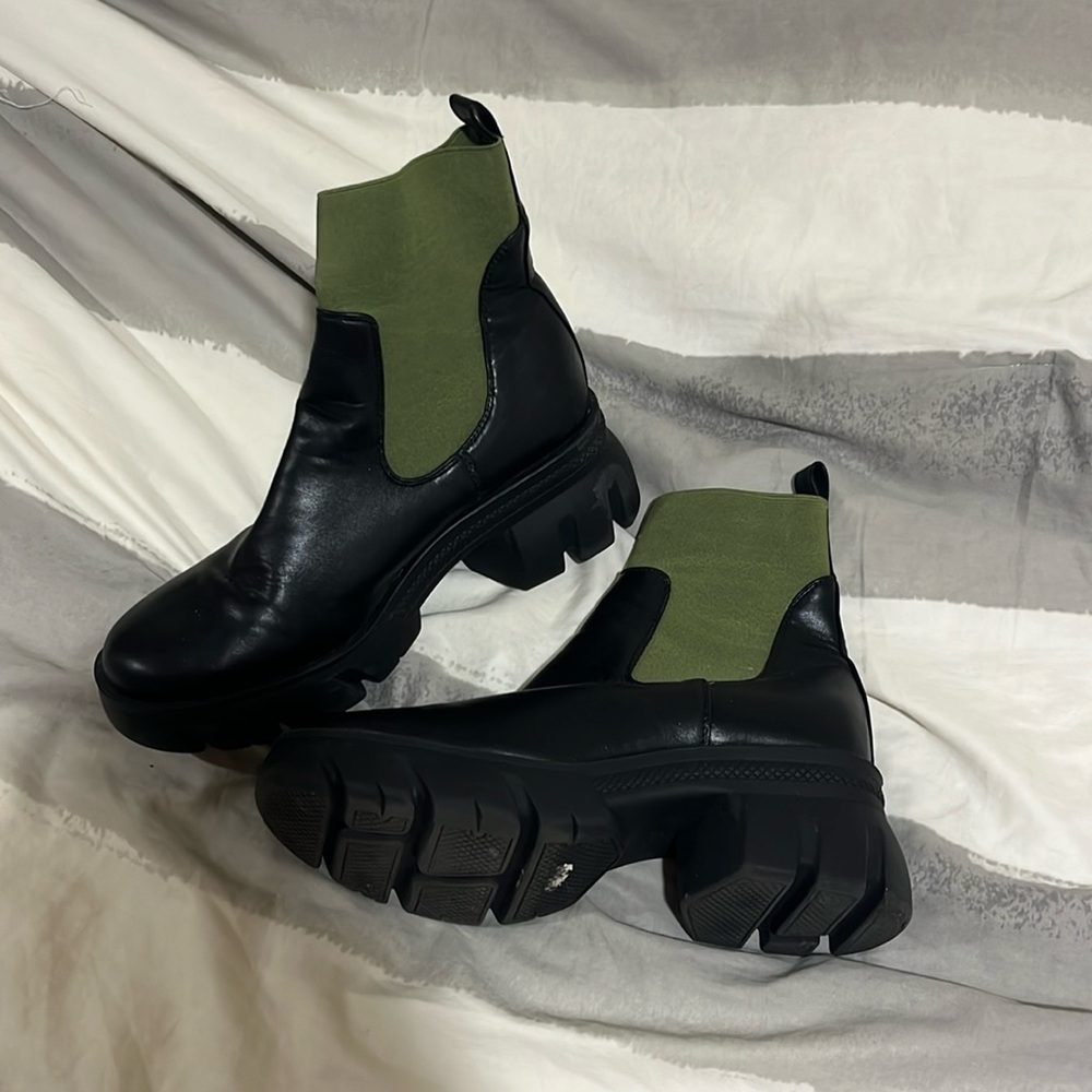 Chunky boots with green detailing